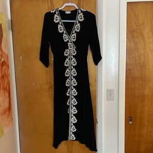 Elegant Black Dress with Ivory Floral Design